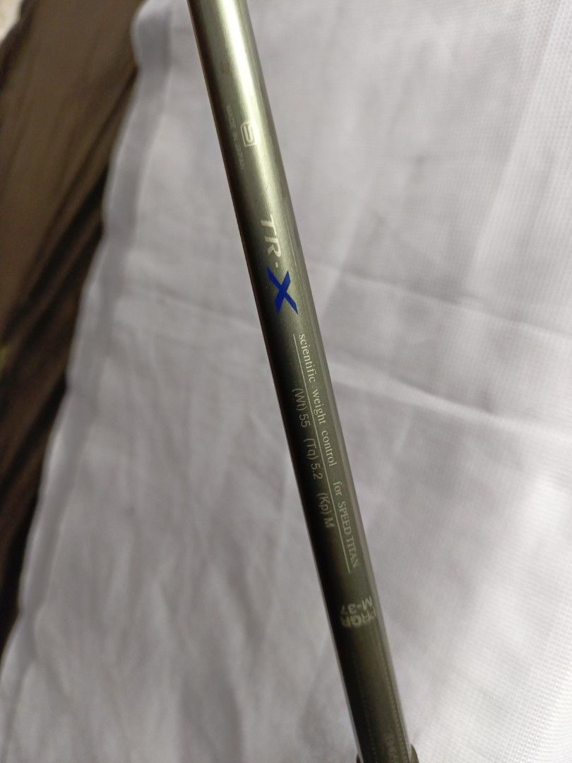 Mizuno Zoid Comp Titanium Driver (Category: Golf) located in Manila. Submitted by yeonmei5614747 (Listing ID 1428852426, Image 3). Description: Mizuno Zoid Comp Titanium driver with a 10.5 loft. Features a TR-X Scientific weight control shaft. The grip is a dark color with a textured surface. The club head has the Mizuno logo. The shaft has PRGR M-37 markings..