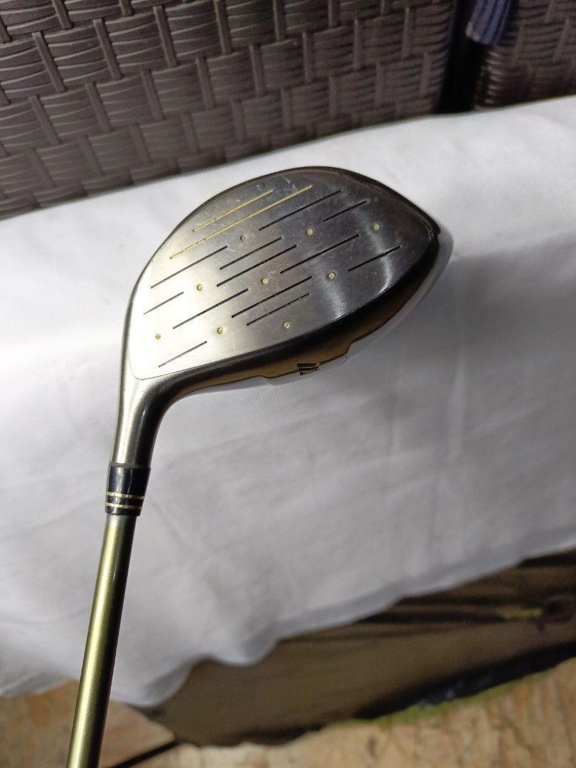 Mizuno Zoid Comp Titanium Driver (Category: Golf) located in Manila. Submitted by yeonmei5614747 (Listing ID 1428852426, Image 2). Description: Mizuno Zoid Comp Titanium driver with a 10.5 loft. Features a TR-X Scientific weight control shaft. The grip is a dark color with a textured surface. The club head has the Mizuno logo. The shaft has PRGR M-37 markings..