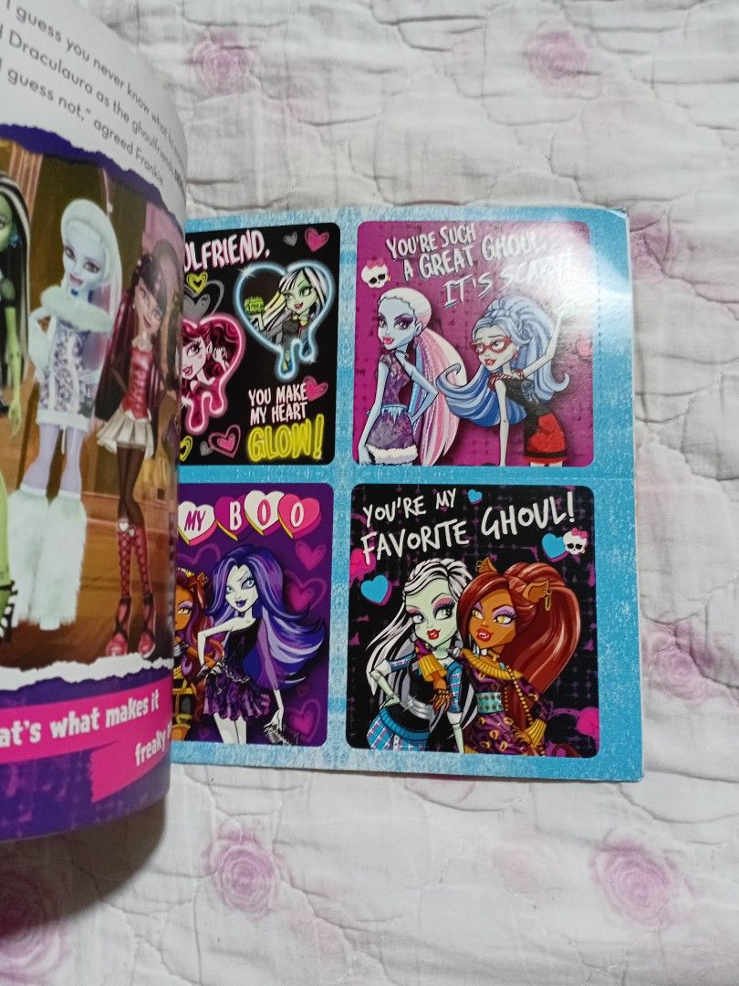 Monster High: Why Do Ghouls Fall in Love? Book (Category: Children's Books) located in San Juan City. Submitted by bisoussofia (Listing ID 1428919905, Image 3). Description: Book is about Monster High. It features characters like Draculaura and Clawdeen. The story revolves around Draculaura's 1600th birthday party. The book includes a set of cards with different Monster High characters. It's a fun read for Monster High fans..