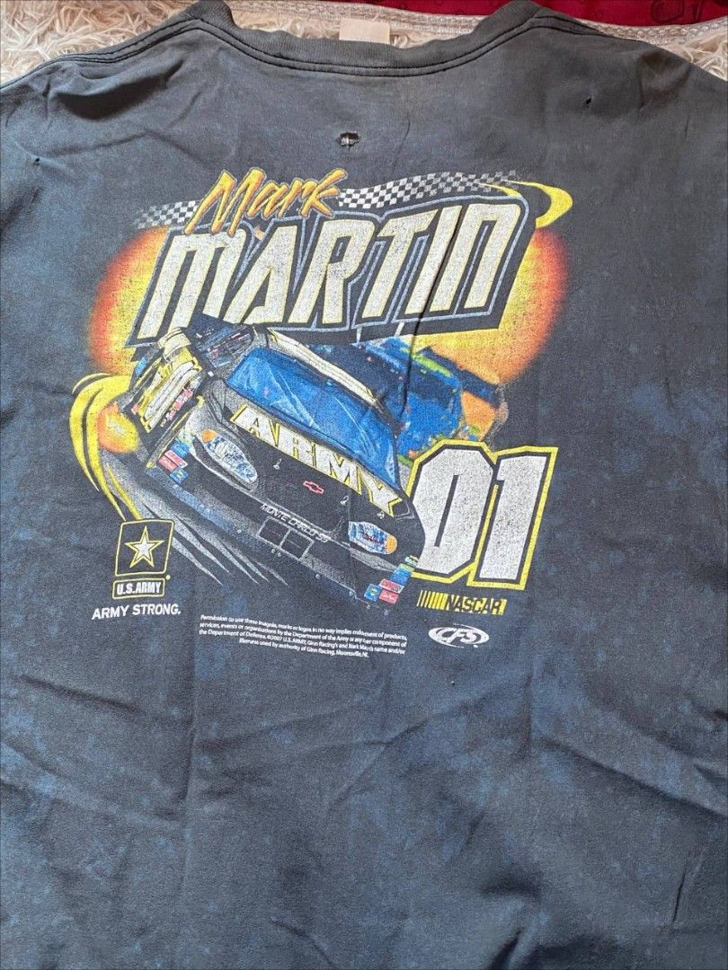 Nascar Mark Martin 2007 Shirt (Category: Tshirts & Polo Shirts ) located in Paranaque City. Submitted by tofu.vntg (Listing ID 1428955411, Image 3). Description: -NASCAR Mark Martin Dated 2007 Shirt -Dimes: 23.5 x 31 -Delta Pro Weight Tag -Issue/s: Faded color, faded&crack prints, bleach staints, penholes&pinholes, lose stitches Open for offers 🫡 📌 Please Read Before Purchasing • All items are vintage / thrifted – expect normal signs of wear du