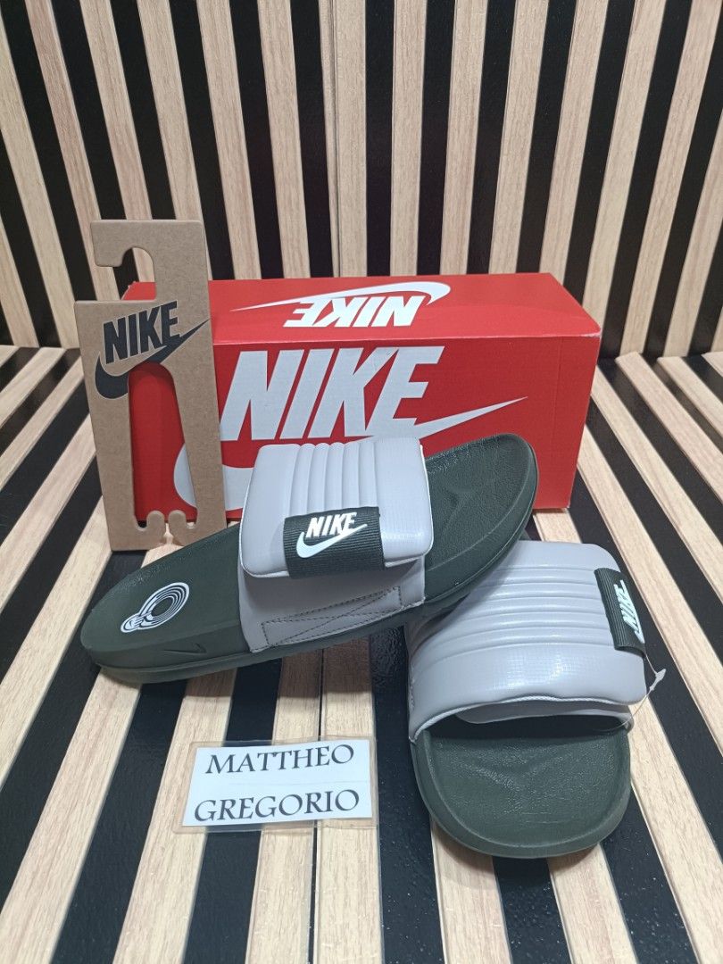 Nike Adjust Offcourt Slides (Category: Slippers & Slides) located in Manila. Submitted by supermat (Listing ID 1428885178, Image 1). Description: BRAND NEW 200% ORIGINAL BELOW RETAIL PRICE 2,195 Size 7 8 9 10 11 12 mens.