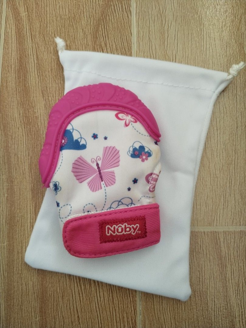 FREE SF💜Nuby Happy Hands Teething Mitten (Category: Soothers & Pacifiers) located in Lipa City. Submitted by abubotcorner (Listing ID 1428840148, Image 2). Description: never used kaya no bite marks, just stored kaya may part na nanilaw. bought this at SM for 659.75, selling for only 350.