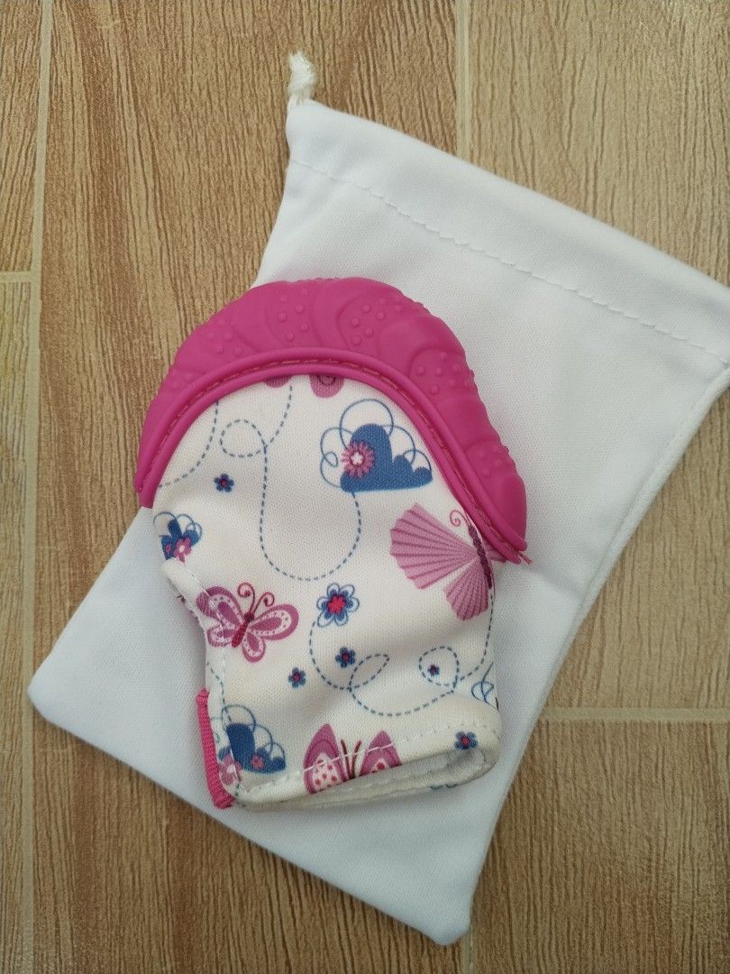 FREE SF💜Nuby Happy Hands Teething Mitten (Category: Soothers & Pacifiers) located in Lipa City. Submitted by abubotcorner (Listing ID 1428840148, Image 3). Description: never used kaya no bite marks, just stored kaya may part na nanilaw. bought this at SM for 659.75, selling for only 350.