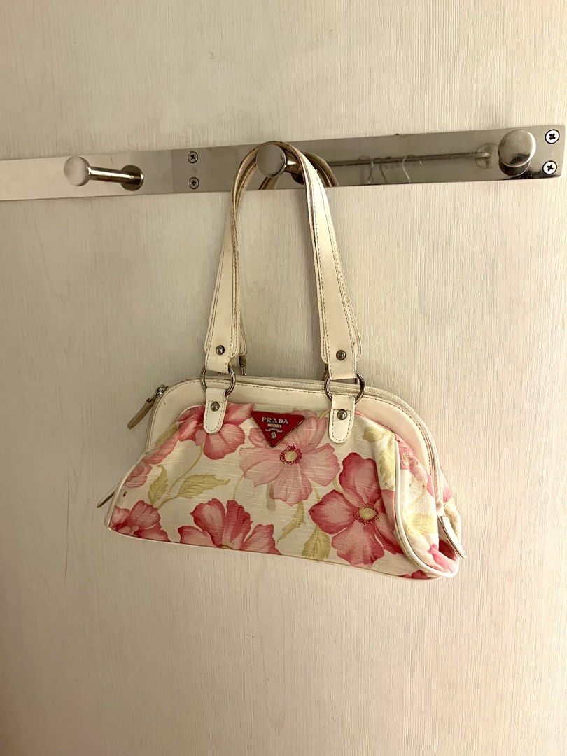 PR4DA small y2k ibiza floral printed pink and yellow kili baguette underarm bag | prad4 bowling mini dumpling summer shoulder bowler bag | AHS pinterest coquette barbiecore fairycore summer coachella kidcore tags: prada (Category: Shoulder Bags) located in Quezon City. Submitted by redumbrella02 (Listing ID 1428888411, Image 1). Description: For self authentication Has flaws. Stains and parang may hardened part on the front part of the canvas. No