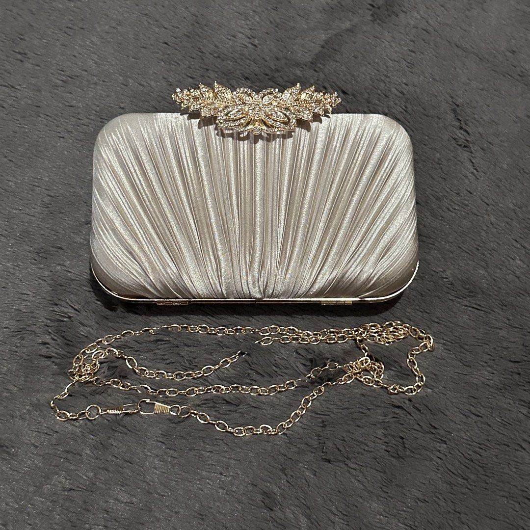 (ON HAND: 1pc.) ARIA Beige- Clutch Bag (Category: Clutches) located in Marikina City. Submitted by lorali.ph (Listing ID 1428832489, Image 1). Description: Dimensions:20*4.8*11.5cm Size: It Fits For Iphone Pro Max Lining Material:Polyester Closure Type: Clasp Compactness: Hard Number of Handles/Straps:Single weight: 320-400g *color may vary due to lighting during photoshoot or color setting in mobile or computer FOR PRE-ORDER Lead time: 8-14 days