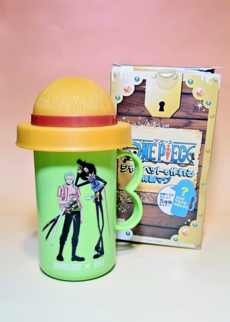 One Piece Sherbet Mug x KFC (Category: Water Bottles & Tumblers) located in Manila. Submitted by yourfavoritethings7 (Listing ID 1428843202, Image 1). Description: Collectible One Piece tumbler from KFC. Features illustrations of Zoro, Sanji, and other characters. Comes with a straw hat-shaped lid and a handle. The tumbler is green with a yellow lid and handle. Includes the original box..
