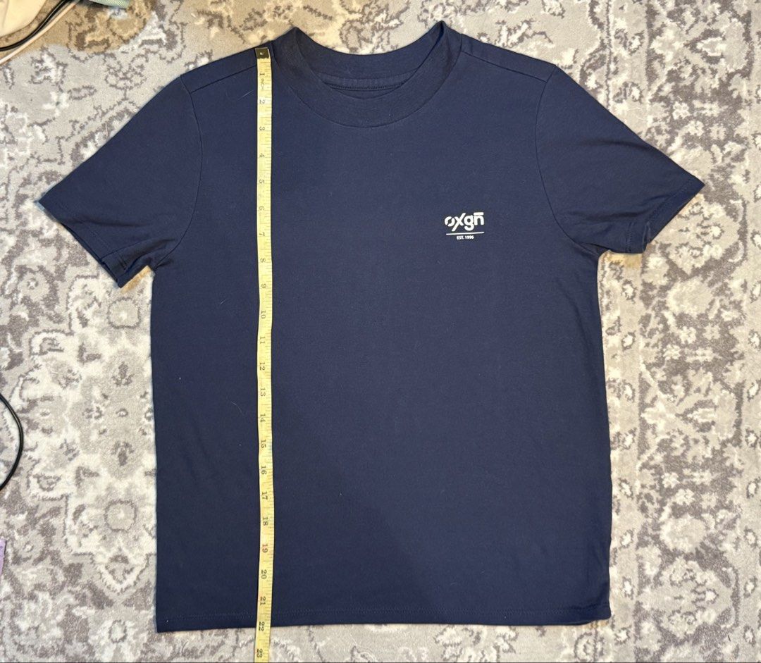 Oxgn Navy Blue T-shirt (Category: Shirts) located in Santa Rosa. Submitted by azisky (Listing ID 1428797182, Image 1). Description: rfs: do not like the fit on me has a high neck line, a little lower than a mock neck.