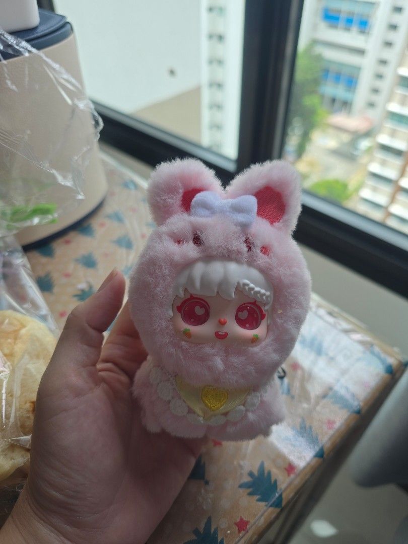 Pink Bunny Keychain (Category: Other Accessories) located in Singapore. Submitted by scwonderland (Listing ID 1428828362, Image 1). Description: Adorable pink bunny keychain. Features a cute doll face and fluffy texture. Comes with a metal ring for easy attachment. Perfect for adding a touch of cuteness to your bag or keys. Never used..
