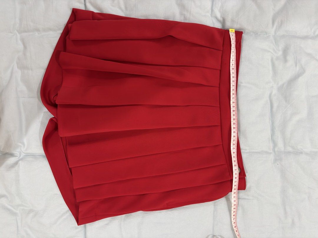 Red Pleated Skort Short Skirt (Category: Skirts) located in Caloocan City. Submitted by foundagain (Listing ID 1428808182, Image 3). Description: used custom tailor made see photos for dimes rfs decluttering payment first before shipping (gcash) dm me for inquiries .