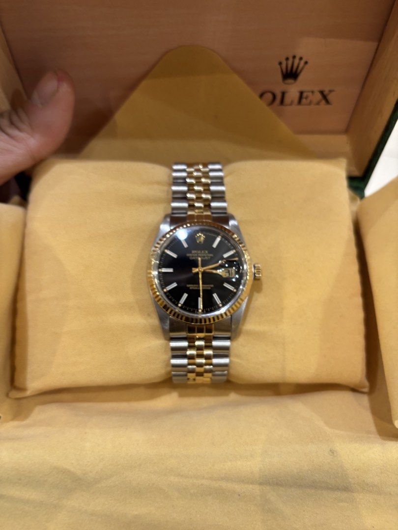 Rolex Datejust 36 Black Dial - Two Tone (Category: Luxury Watches) located in Manila. Submitted by aldrinpaolotiu (Listing ID 1428890608, Image 2). Description: Rolex Datejust 36mm 16013 Black Dial Two Tone - 18K Yellow Gold Jubilee Bracelet All original factory settings Asking Price: 330k Comes with original Rolex box, extra links, and authentication receipt Open for further authentication Meetups at Greenhills / Makati.