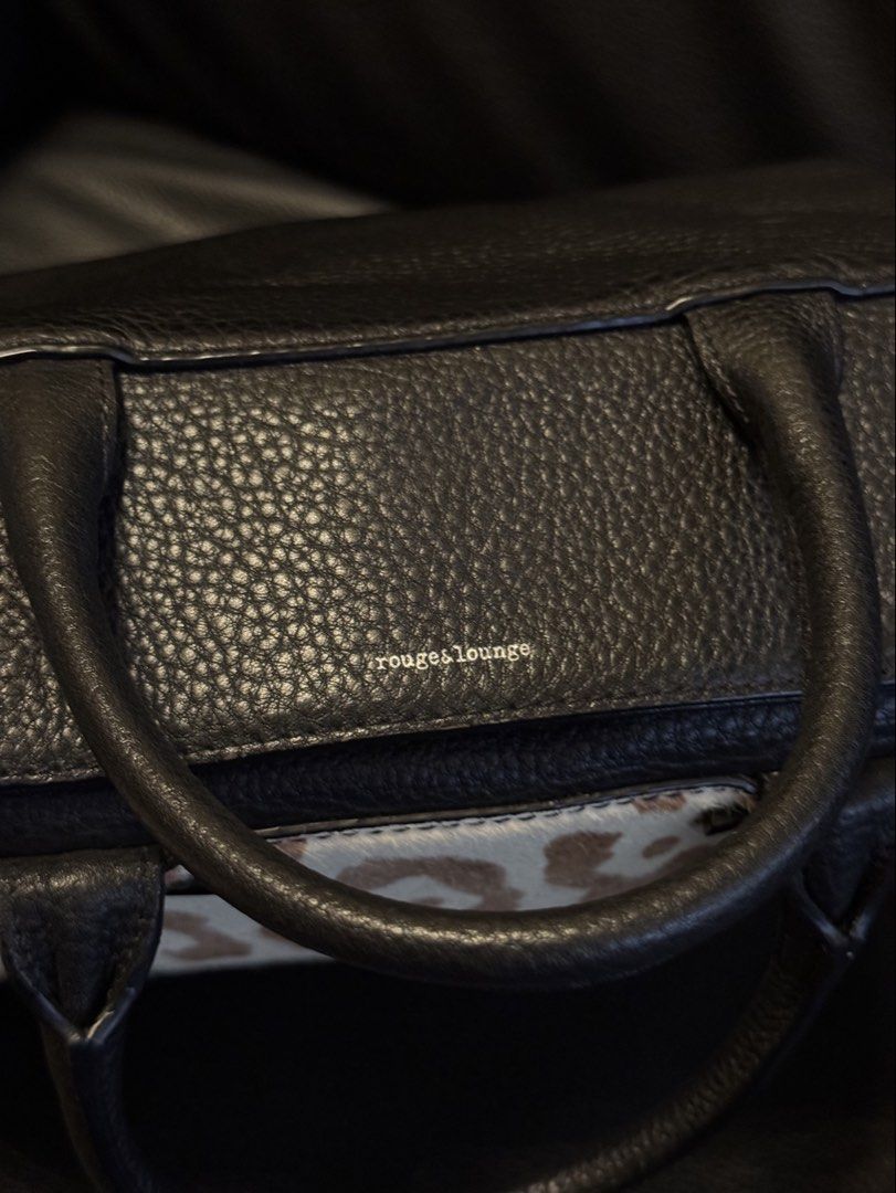 Rouge & Lounge “KARIS” Handbag (Category: Luxury Bags & Wallets) located in Davao. Submitted by _iconculture (Listing ID 1428894090, Image 3). Description: available Authentic (R)ouge&Lounge “Karis” Bag (Korean Luxury Brand) ₱1250 + sf 9/10 very good condition clean interior very very spacious! some bald spot on calf hair ❤️‍🩹 (unnoticable ww) + small surface marks on the side, see photos! with long strap code: AHN4XK170BE Retails for 20K++ peso