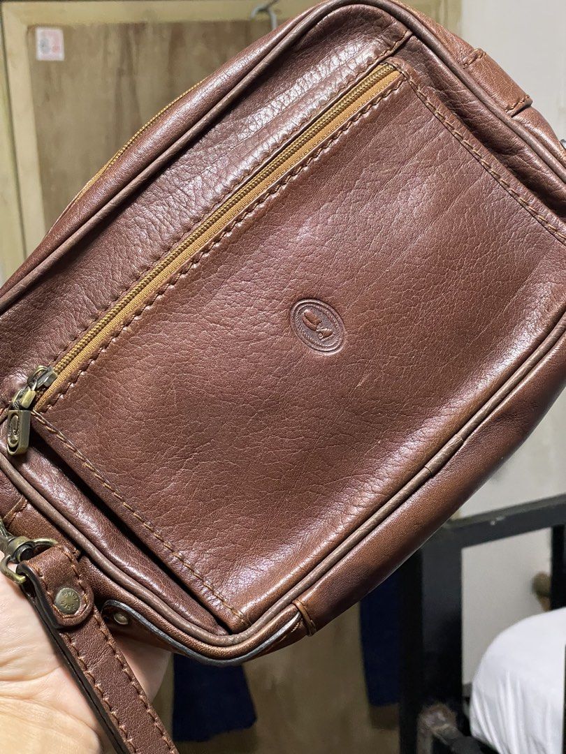 Saint Jack Brown Leather Clutch Bag (Category: Luxury Bags & Wallets) located in Cavite. Submitted by dexterthepilot (Listing ID 1428944422, Image 3). Description: Vintage Saint Jack London Clutch Bag Pure genuine leather All zippers working in good condition In excellent condition 9/10 With wrist strap Approx 10inches by 6inches Php1,500 only Delivery thru LBC/JnT Call/Text: 09066347110 .