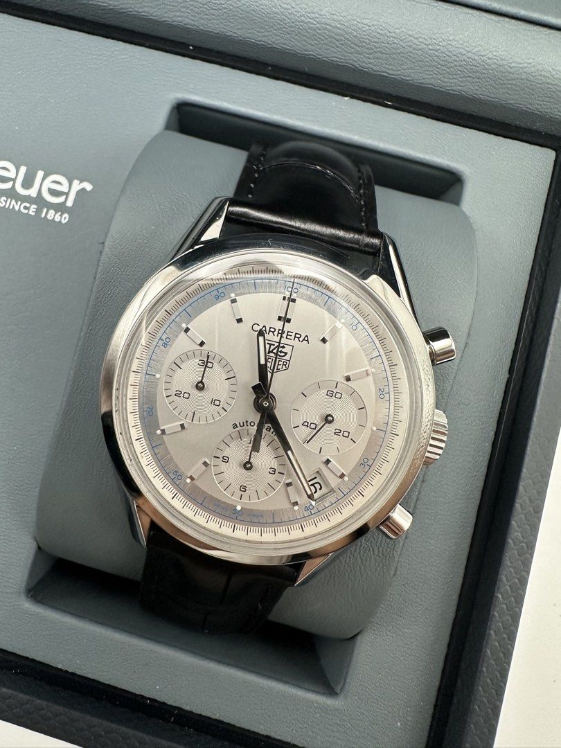 Tag Heuer Carrera 39mm Automatic Chronograph Silver Dial (Category: Luxury Watches) located in Manila. Submitted by rj_authenticwatchesandmore (Listing ID 1428911840, Image 1). Description: Tag Heuer Carrera Automatic Chronograph ✅Domed Pie Pan Shaped Crystal with double AR Coating ✅Silver Dial ✅Reference Model CV2110-0 ✅39mm case diameter ✅Automatic Calibre 17 movement Inclusions: watch and box Condition: Excellent, strap and clasp are new and u