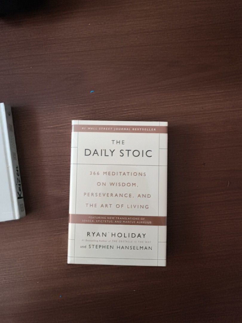 The Daily Stoic by Ryan Holiday (Category: Storybooks) located in Manila. Submitted by akyom_123 (Listing ID 1428986118, Image 1). Description: Daily Stoic by Ryan Holiday and Stephen Hanselman. This book offers 366 meditations on wisdom, perseverance, and the art of living. It is a compilation of insights from Stoic philosophers. The back cover features quotes and a barcode..