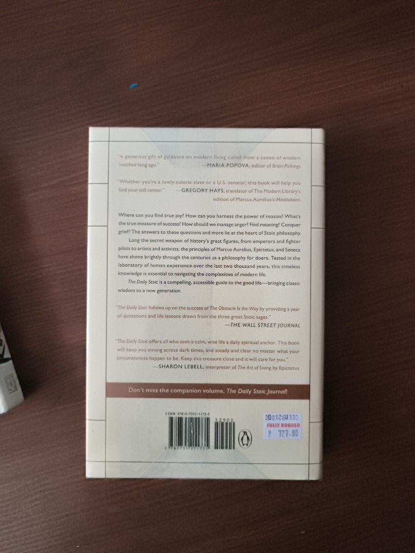 The Daily Stoic by Ryan Holiday (Category: Storybooks) located in Manila. Submitted by akyom_123 (Listing ID 1428986118, Image 2). Description: Daily Stoic by Ryan Holiday and Stephen Hanselman. This book offers 366 meditations on wisdom, perseverance, and the art of living. It is a compilation of insights from Stoic philosophers. The back cover features quotes and a barcode..
