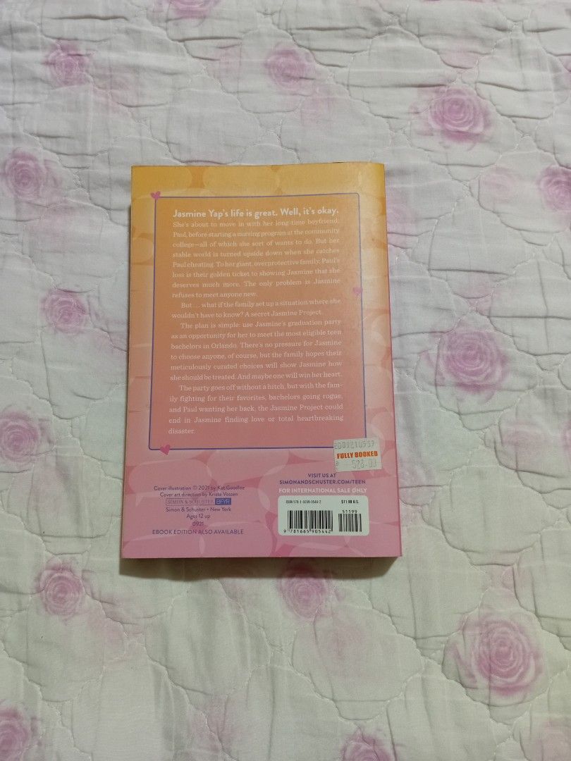 The Jasmine Project by Meredith Ireland Preloved (Category: Storybooks) located in San Juan City. Submitted by bisoussofia (Listing ID 1428906248, Image 3). Description: Copy of "The Jasmine Project" by Meredith Ireland. The book has a pink and orange cover with a girl holding a phone. The spine of the book shows the title and author's name. The back of the book has text..