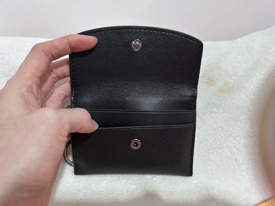 Tumi Black Leather Card Coin Wallet (Category: Wallets & Card holders) located in Quezon City. Submitted by kat.sy (Listing ID 1428879321, Image 2). Description: Bought last Dec 2025. Barely use. Bought for 4500 in pasabuy.