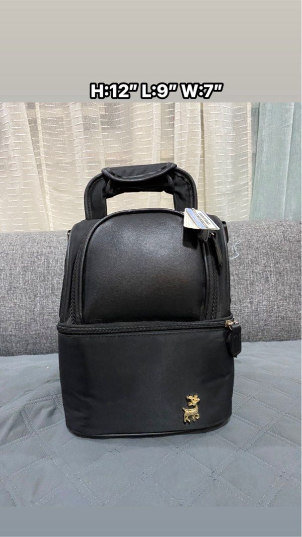 V-CooL Cooler Bag (Category: Air Conditioning and Heating) located in Davao. Submitted by kurt2021.turtle (Listing ID 1428795470, Image 1). Description: V-CooL cooler bag is perfect for keeping your items cool. It features a top handle and a detachable shoulder strap for easy carrying. The bag has a front pocket and a spacious interior. It has dimensions of 12"H x 9"L x 7"W. The bag is made of 100% polyester and is environmental friendly EPE. It 