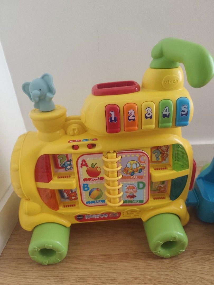 VTech Push & Ride Alphabet Train (Category: Educational & Learning Toys) located in Paranaque City. Submitted by mdrjtb (Listing ID 1428876554, Image 3). Description: Bagong bago po with box, naassemble lang po at nagamit ng baby ko saglit. Three stages of progressive gameplay: Floor game mode, Learning to ride mode, and Riding mode. 13 double-sided letter blocks for teaching letter recognition A 6-page alphabet book with tear-resistant and water