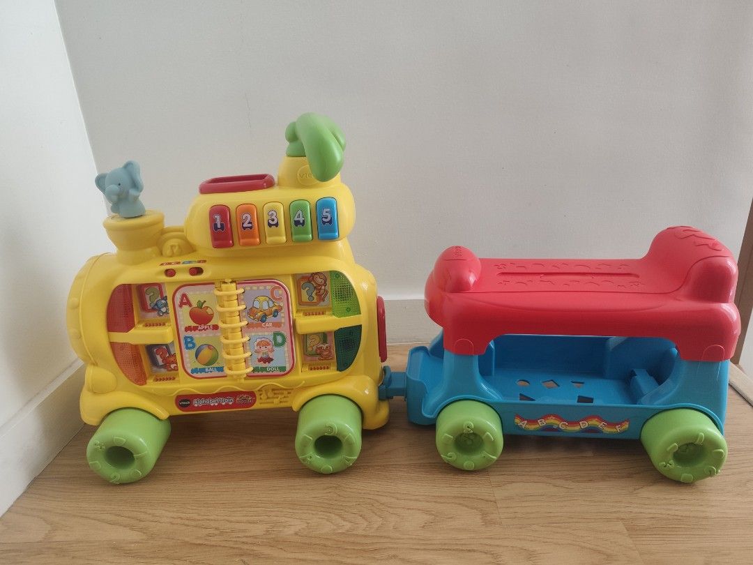VTech Push & Ride Alphabet Train (Category: Educational & Learning Toys) located in Paranaque City. Submitted by mdrjtb (Listing ID 1428876554, Image 2). Description: Bagong bago po with box, naassemble lang po at nagamit ng baby ko saglit. Three stages of progressive gameplay: Floor game mode, Learning to ride mode, and Riding mode. 13 double-sided letter blocks for teaching letter recognition A 6-page alphabet book with tear-resistant and water