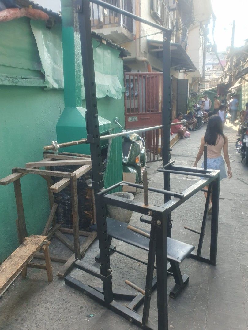 Weightlifting Rack with Bench and Barbell (Category: Weights & Dumbbells) located in Manila. Submitted by itsme_trish (Listing ID 1428947541, Image 3). Description: SELL RUSH HEAVY DUTY SQUATRACK MACHINE W DITACHEMENT BAR MAY LAGAYAN NA RIN NG PLATES PDE MAG PULL UP & DIPS MAY KASAMANG BENCH & 6FT LONGBAR PM MURA NALANG PO.