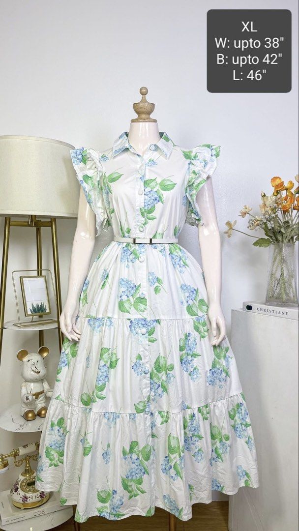XL Floral Dress (Category: Dresses) located in Quezon City. Submitted by nothie (Listing ID 1428854215, Image 1). Description: Beautiful XL dress with a floral print. Features a collared neckline, button-down front, and a tiered skirt. Includes a belt to cinch the waist. Measurements: W up to 38", B up to 42", L 46". Perfect for a casual day out or a special occasion..