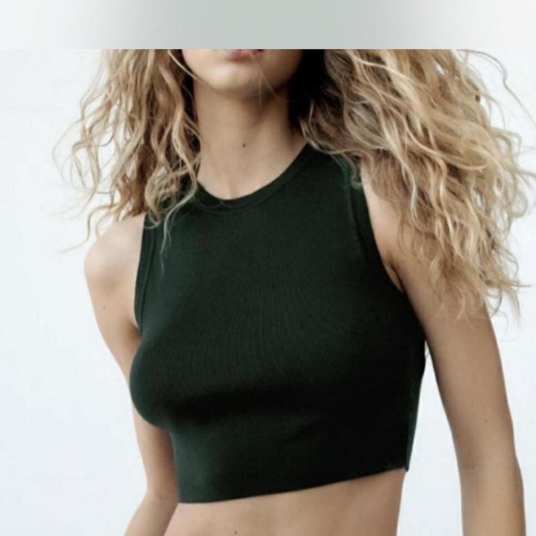 ZARA Sleeveless Knit Crop Top (Category: Sleeveless) located in Quezon City. Submitted by mer.declutters (Listing ID 1428796308, Image 2). Description: - Zara Sleeveless Knit Crop Top - Size: L - Color: Dark Green - Design: Crop top - Material: Knit - Condition: Excellent - Brand: Zara Large on tag but fits like Medium.