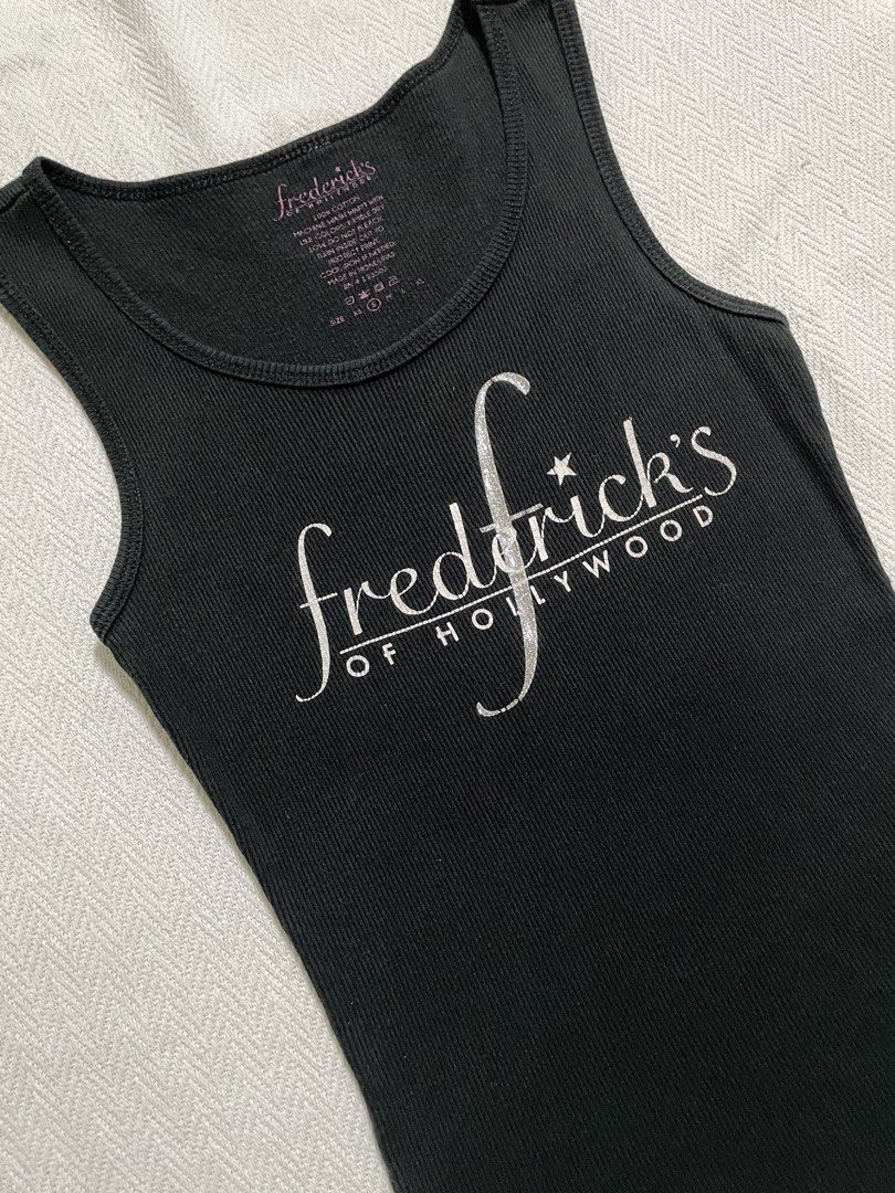 2000s y2k authentic fredricks holly black graphic tank top (Category: Sleeveless) located in Quezon City. Submitted by mossimoss (Listing ID 1429137149, Image 3). Description: chest 12.5 waist 11 length 24 [measured in inches laid flat].