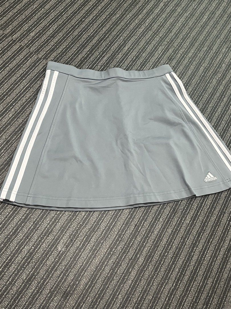Adidas 3 stripes Skirt Gray (Category: Skirts) located in Pasig City. Submitted by pm_dk (Listing ID 1352910859, Image 1). Description: W: 29.5 inch L: 14.5 Rfs: Decluttering & sobrang luwag sakin Loc: Pasig - No shorts inside.
