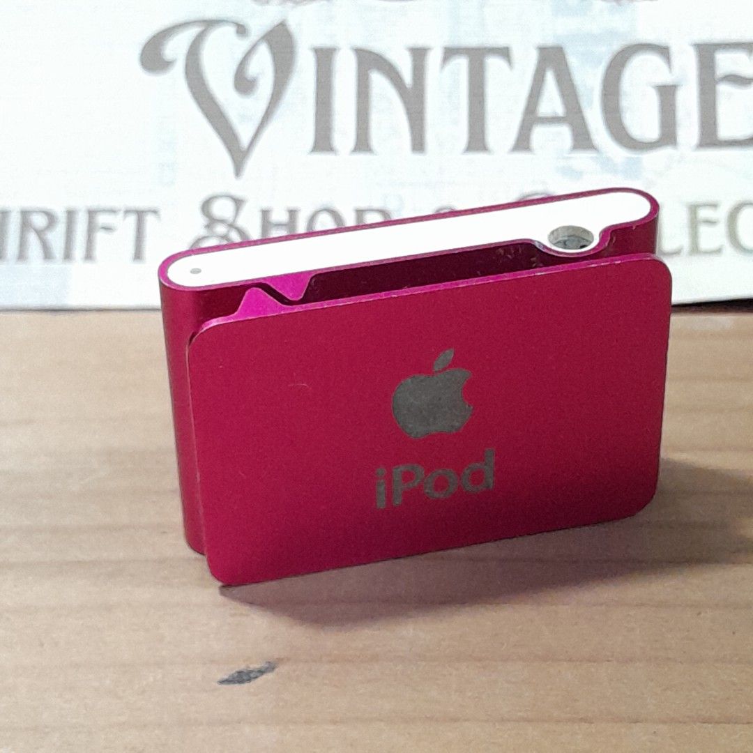 Apple iPod Shuffle 2nd Gen (Category: Portable Music Players) located in Las Pinas. Submitted by 84vintage (Listing ID 1429157133, Image 2). Description: Apple iPod Shuffle 2nd Gen 1GB in a vibrant pink! Comes with one song so you'll know it works. This little music player is perfect for on-the-go Vintage vibe listening. It's got that classic Apple design, compact and easy to clip on. The condition is pretty good, showing some minimal signs of us