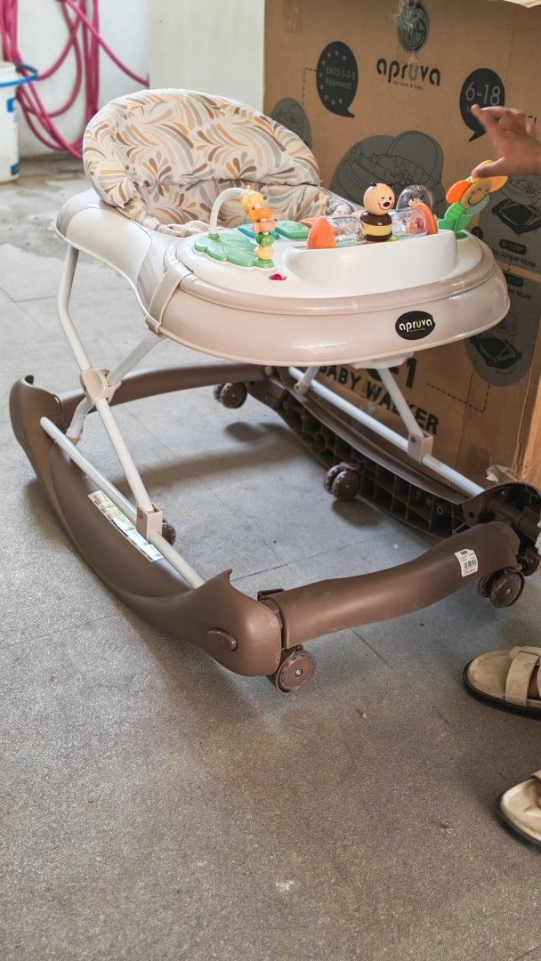 Apruva 4-in-1 Baby Walker (Category: Infant Playtime) located in Calamba. Submitted by puremoon_99c9e1 (Listing ID 1429120049, Image 2). Description: apruva walker nagiging racker sya na fo fold din para save sa space, with box pa. no issue malinis upuan walang punit at sira pwedeng pwede sa maselan.