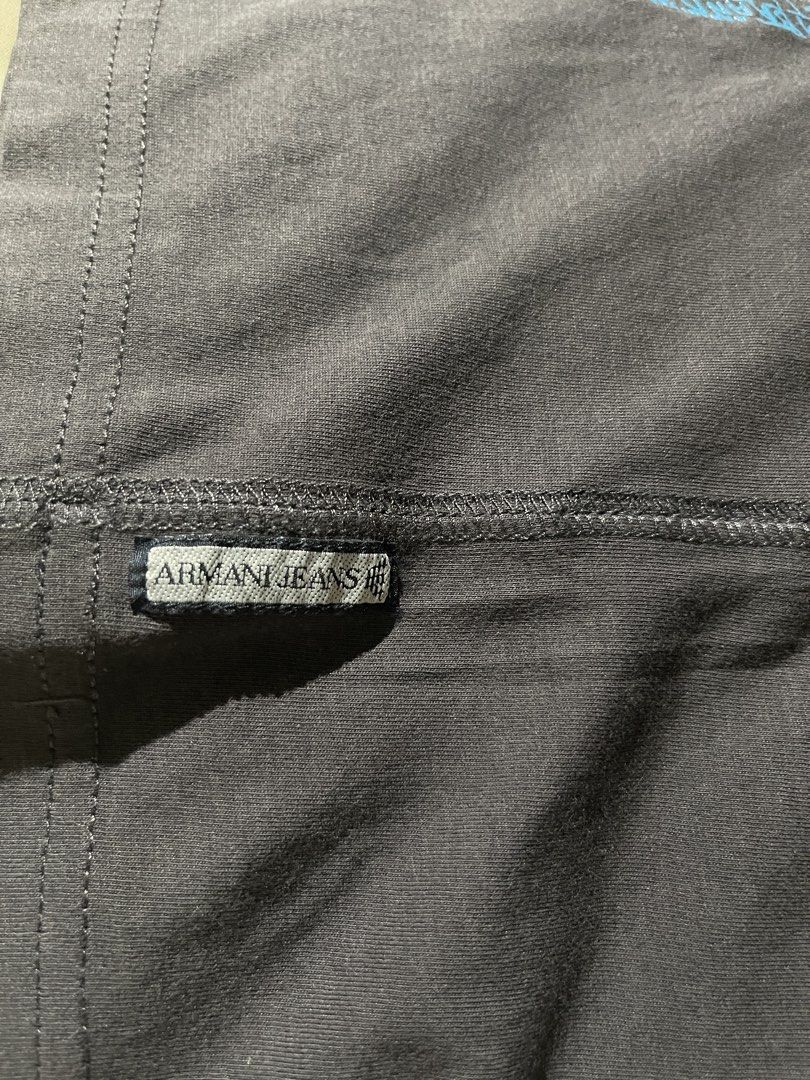 Armani Jeans Graphic T-shirt (Category: Tshirts & Polo Shirts ) located in Paranaque City. Submitted by vrias (Listing ID 1429150970, Image 3). Description: - 100% Original - Pristine Condition - Width 39 inches - Length 25 inches - Bought in Dubai Dutyfree ( My husband works at Dubai Dutyfree) - I removed the tag because my son feels uncomfortable when wearing shirts with tags. Location - Azure Bicutan Parañaque.