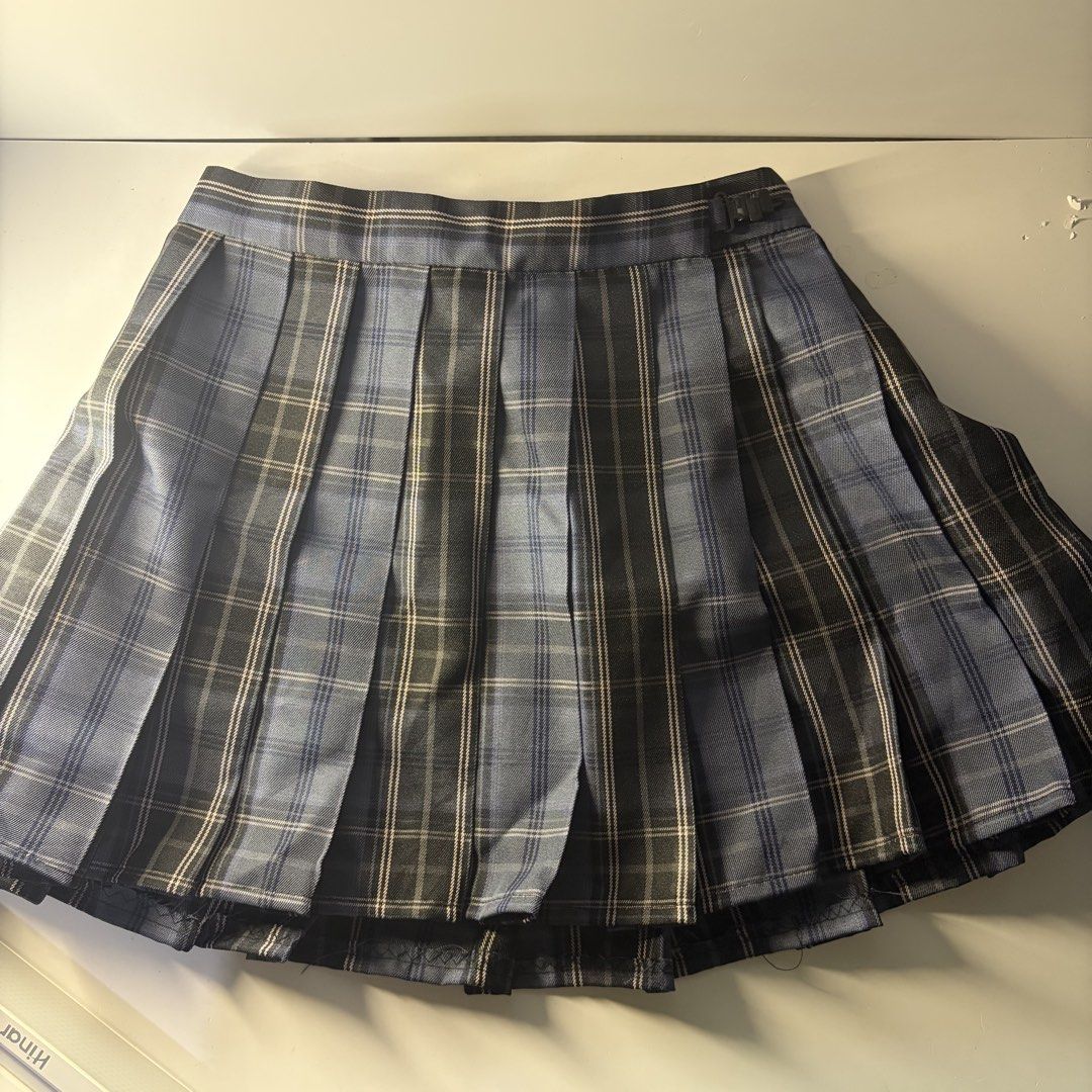 Black & Blue Plaid Pleated Mini Skirt (Category: Skirts) located in Marikina City. Submitted by handpickeda2z (Listing ID 1429134964, Image 1). Description: Fits 23-25 Adjustable.