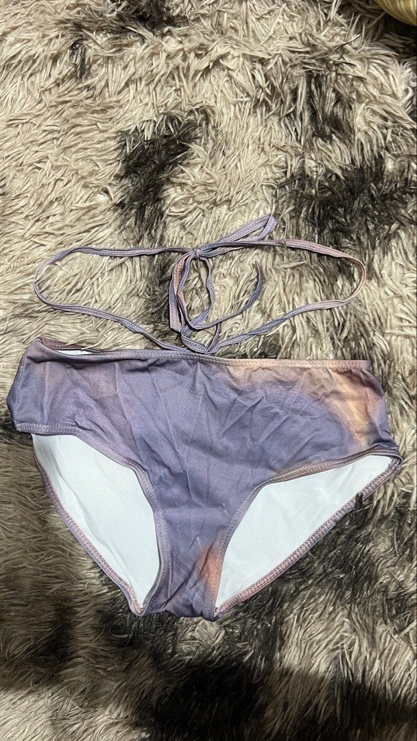 Bliss 3 in 1 (Category: Bikinis & Swimsuits) located in Trece Martires City. Submitted by a.gicelle (Listing ID 1429103752, Image 3). Description: - Bliss 3-in-1 set - Size: L -Used Once, picture taking only - Features a draped top and skirt - Color: Purple - Material: Flowy and comfortable - Condition: Excellent - Perfect for special occasions.