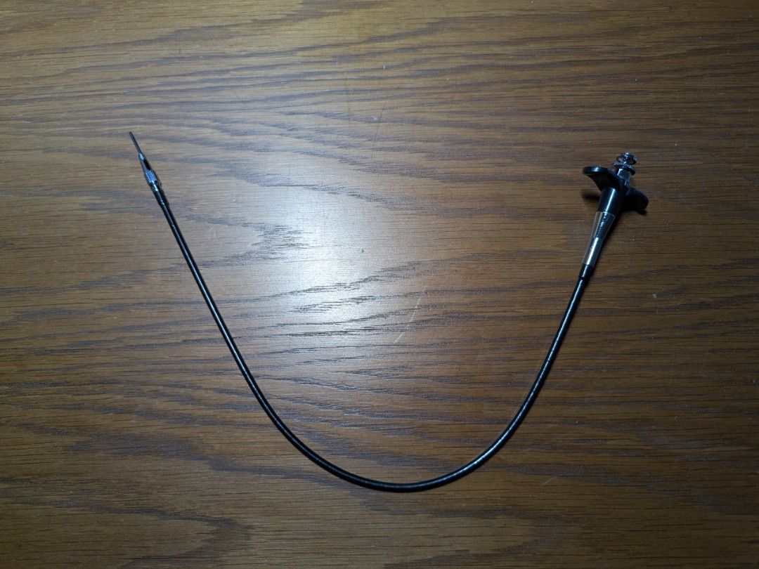Camera Cable Release (Category: Other Photography Accessories) located in Singapore. Submitted by tuckomatic (Listing ID 1429147130, Image 2). Description: button to screw length is approximately 40cm. mechanical cable release for a camera. The cable is flexible and the release mechanism looks to be working well. Perfect for long exposures or reducing camera shake..