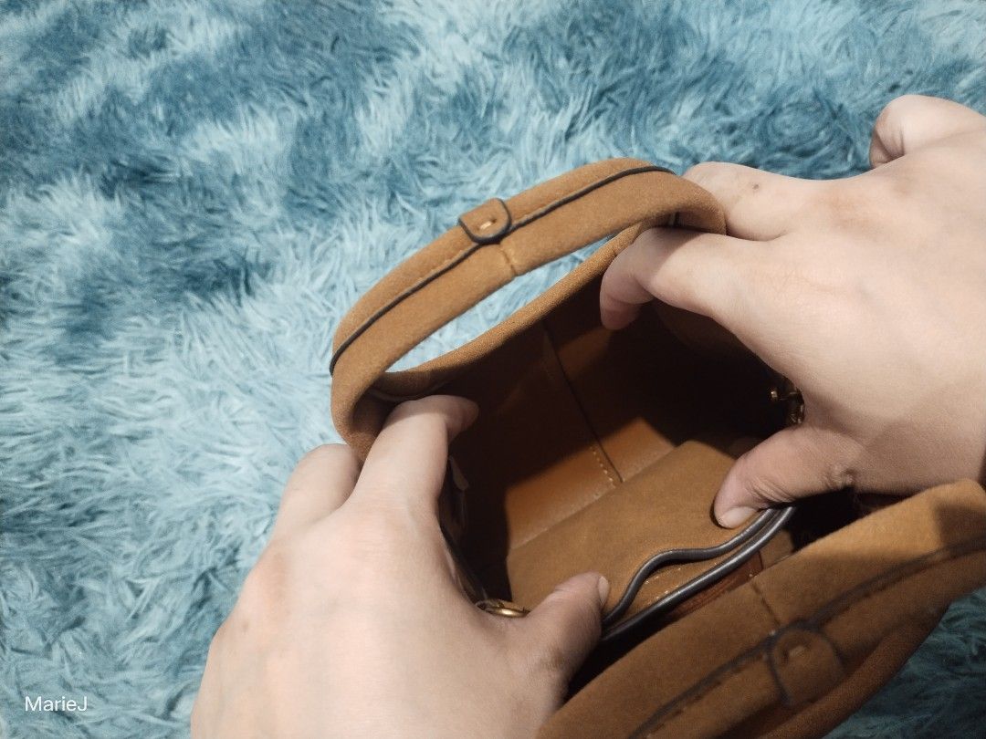 Coach Lana 19 (Category: Luxury Bags & Wallets) located in Manila. Submitted by inamarie.j104 (Listing ID 1429068698, Image 3). Description: Brown Suede Handbag with Chain Strap dustbag paperbag.
