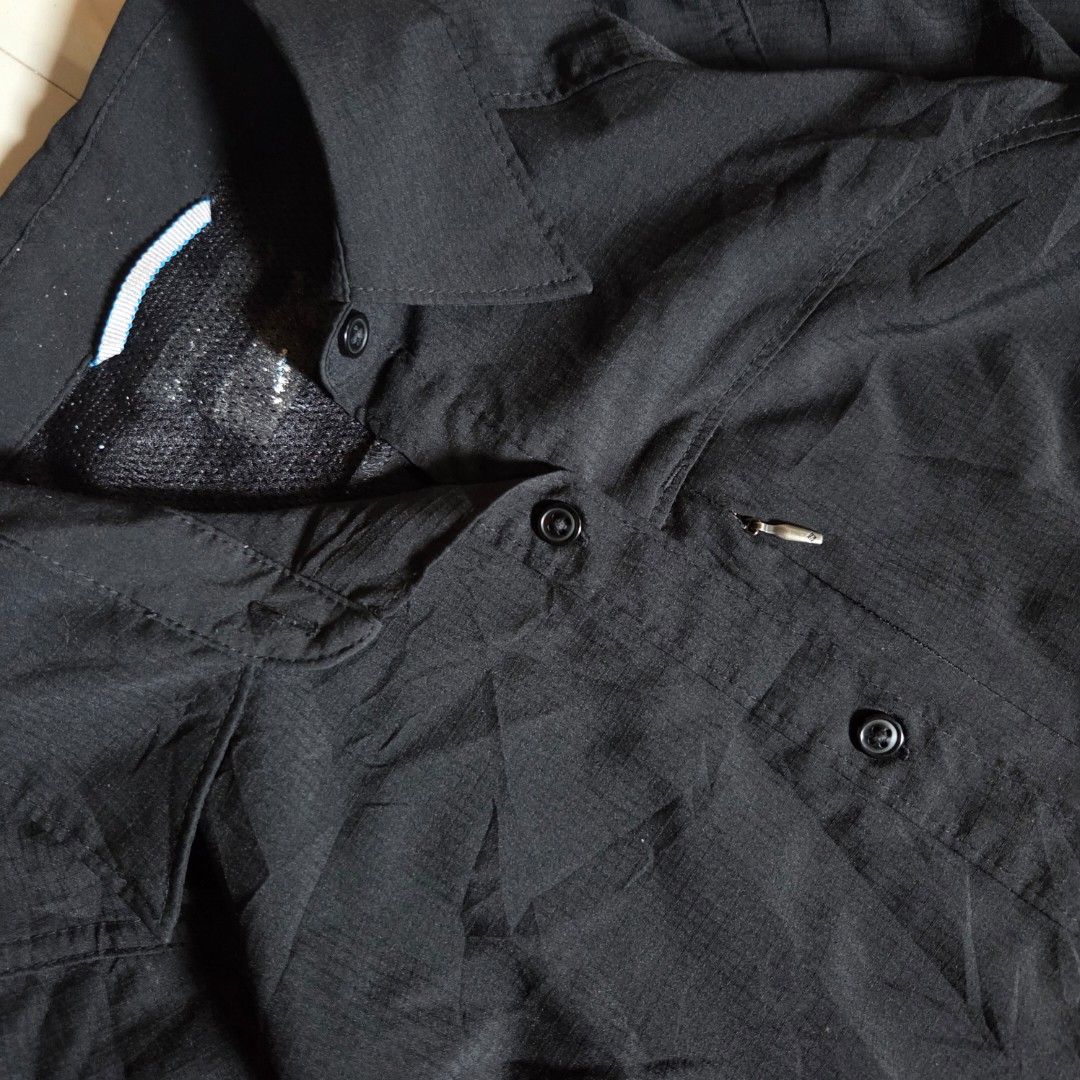 COLUMBIA Button Down Long Sleeve Shirt PFG (Category: Activewear) located in Tayabas. Submitted by old.dani (Listing ID 1429039759, Image 3). Description: Fitting: Men - S ; Womem - Tall Slim M ‎Length: 25 ‎Width: Bust - 17 ; W - 15.5 ‎Shoulder: 14.5 ‎Arm Space: 8.5 ‎Sleeve Length: 24.5 ‎ ‎Color: Black Color Rate: 9.8 ‎Material: 100% Polyester Hardware: Zipper, Buttons, & Sleeve Tab ‎Issue: N/A ‎Condition: Excellent.