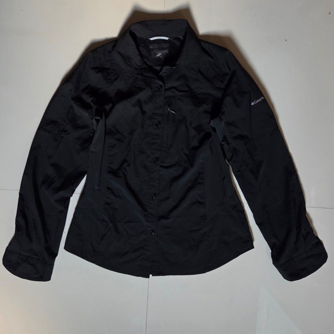 COLUMBIA Button Down Long Sleeve Shirt PFG (Category: Activewear) located in Tayabas. Submitted by old.dani (Listing ID 1429039759, Image 1). Description: Fitting: Men - S ; Womem - Tall Slim M ‎Length: 25 ‎Width: Bust - 17 ; W - 15.5 ‎Shoulder: 14.5 ‎Arm Space: 8.5 ‎Sleeve Length: 24.5 ‎ ‎Color: Black Color Rate: 9.8 ‎Material: 100% Polyester Hardware: Zipper, Buttons, & Sleeve Tab ‎Issue: N/A ‎Condition: Excellent.