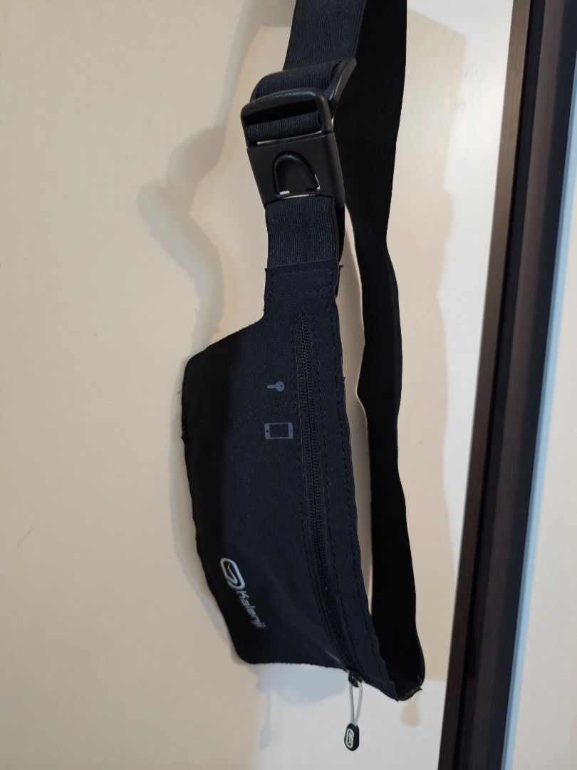 Decatlon Running Belt for Phone (Category: Belts) located in Las Pinas. Submitted by specteretceps (Listing ID 1429086236, Image 1). Description: Kalenji running belt is perfect for keeping your essentials secure while you exercise. It features a zippered pocket for your phone, keys, and other small items. The adjustable strap ensures a comfortable fit. The belt is black and has the Kalenji logo on the front. It also has a headphone port..