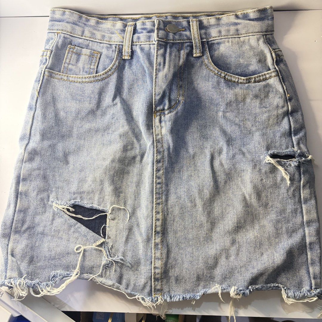 Denim Skirt with Distressed Details (Category: Skirts) located in Marikina City. Submitted by handpickeda2z (Listing ID 1429134597, Image 1). Description: Fits 24-25.