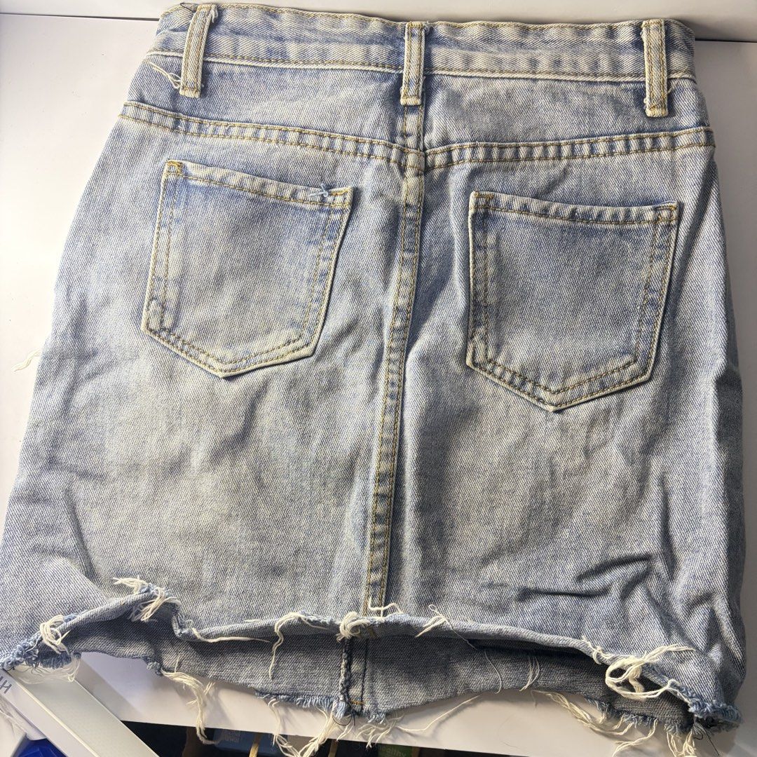Denim Skirt with Distressed Details (Category: Skirts) located in Marikina City. Submitted by handpickeda2z (Listing ID 1429134597, Image 2). Description: Fits 24-25.
