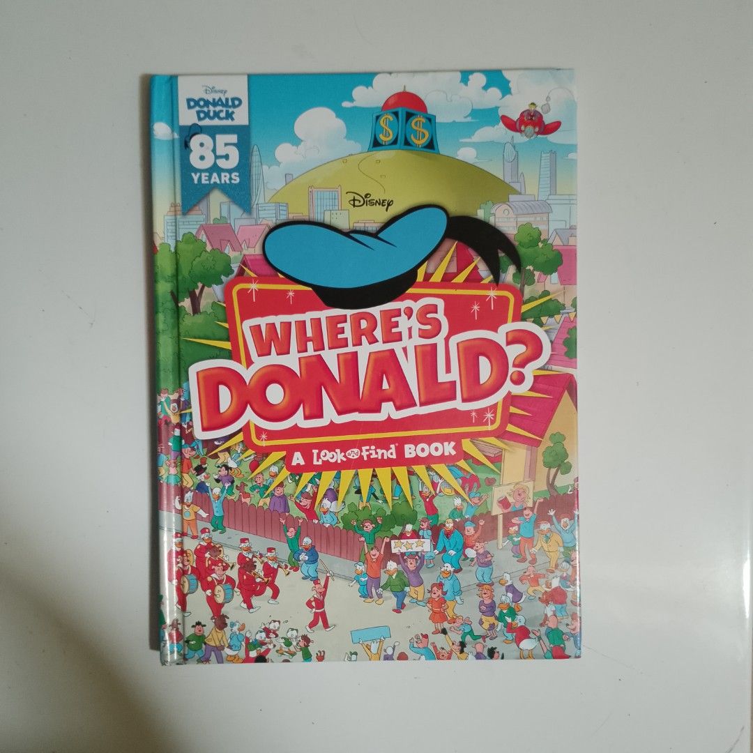 Disney Where's Donald? Look & Find Book (Category: Children's Books) located in Calumpit. Submitted by BCHThriftShop (Listing ID 1429099502, Image 1). Description: Disney Where's Donald? Look & Find book. It celebrates 85 years of Donald Duck. The book features Donald Duck and his family and friends as they travel across the globe and beyond. It is published by Phoenix International Publications, Inc. and has a CE mark..