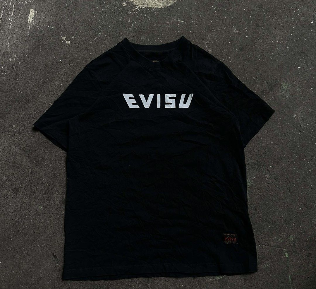 EVISU Koi Fish Graphic T-Shirt (Category: Tshirts & Polo Shirts ) located in Taguig. Submitted by thriftboy23 (Listing ID 1428996489, Image 3). Description: M to L Issue: May maliit na angat sa print 9.5/10 Color rate .
