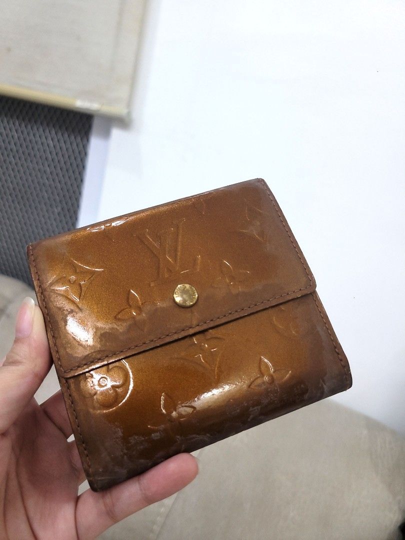 Guaranteed Auth Project Louis Vuitton Trifold Wallet Vernis (Category: Luxury Bags & Wallets) located in Antipolo. Submitted by dlolin (Listing ID 1429160265, Image 2). Description: Authentic Louis Vuitton trifold wallet. Features a brown exterior with the iconic LV monogram pattern. The interior has multiple card slots and a coin compartment. Made in France..