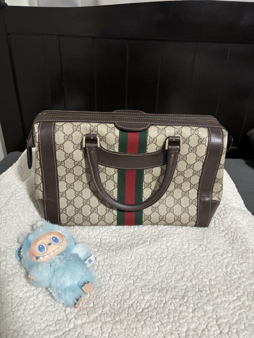 Gucci Boston Bag with Web Stripe (Sherryline) (Category: Luxury Bags & Wallets) located in Mandaluyong City. Submitted by paaqu0801 (Listing ID 1429023039, Image 1). Description: Selling my Gucci Boston Bag, a timeless and versatile piece perfect for everyday use or even light travel. 👜 Details: • Brand: Gucci • Model: Boston Bag • Material: Canvas & Leather • Inclusion: Bag only • Source: Bought from Japan (surplus/preloved shop) ✨ Condition: •