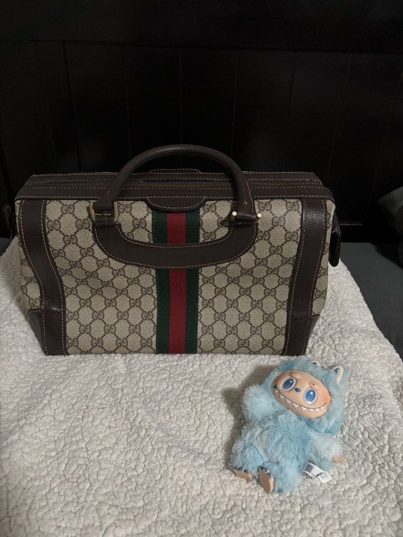 Gucci Boston Bag with Web Stripe (Sherryline) (Category: Luxury Bags & Wallets) located in Mandaluyong City. Submitted by paaqu0801 (Listing ID 1429023039, Image 2). Description: Selling my Gucci Boston Bag, a timeless and versatile piece perfect for everyday use or even light travel. 👜 Details: • Brand: Gucci • Model: Boston Bag • Material: Canvas & Leather • Inclusion: Bag only • Source: Bought from Japan (surplus/preloved shop) ✨ Condition: •