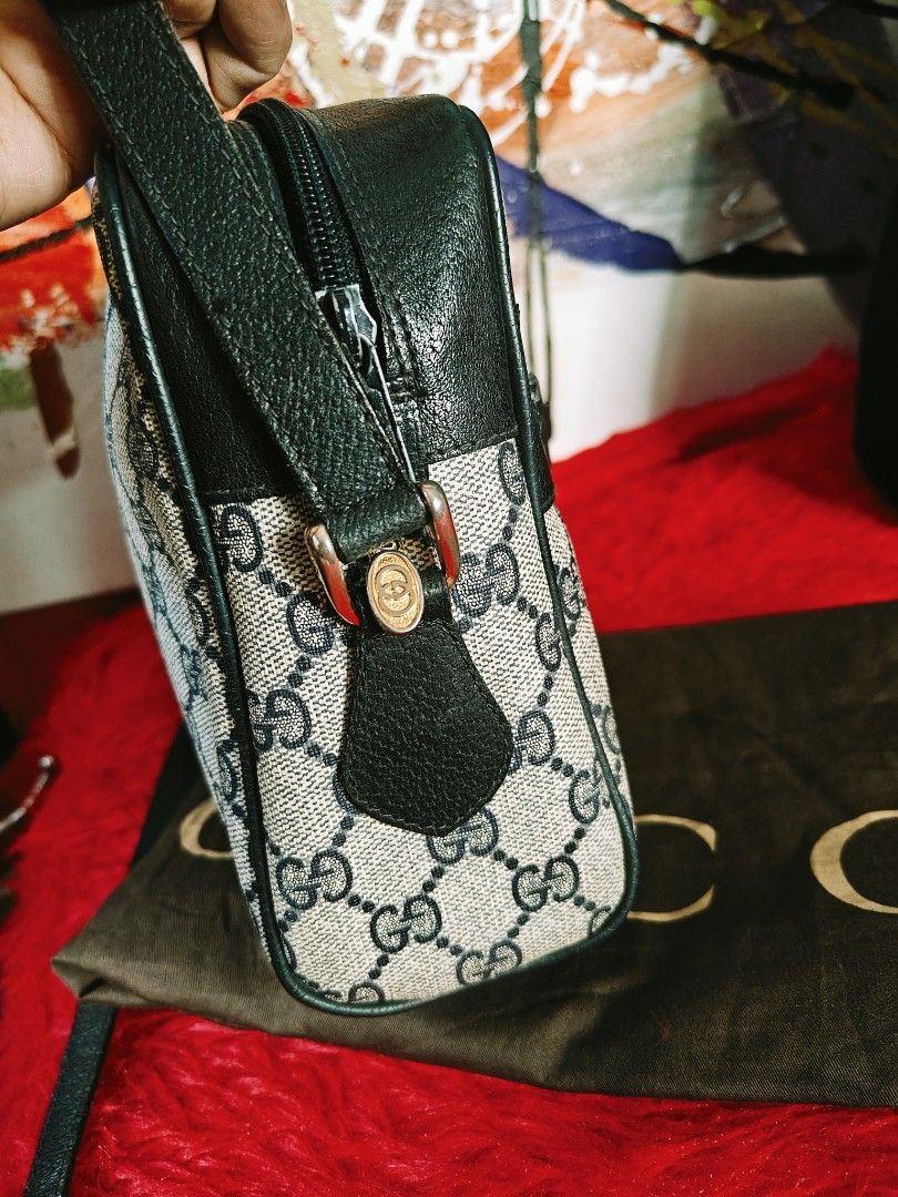Gucci Cherryline sling/ shoulder Bag (Category: Luxury Bags & Wallets) located in Las Pinas. Submitted by liezel49 (Listing ID 1429160416, Image 3). Description: Authentic Gucci Accessory Collection shoulder bag. Features the iconic GG monogram pvc with a red and navy stripe. Includes a black leather strap and trim. The interior has a Gucci label. Comes with a dust bag. Made in Italy..