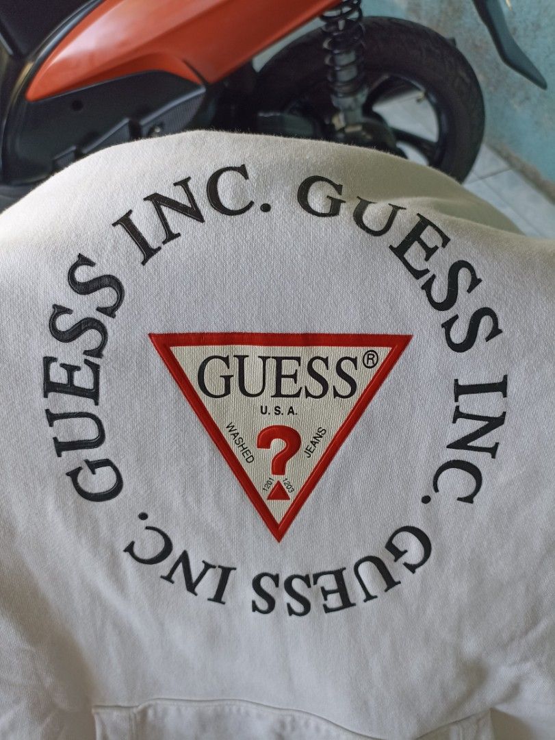 Guess Inc. White Hoodie - Large (Category: Hoodies) located in Cabadbaran. Submitted by _allgoodsthrift (Listing ID 1429038120, Image 2). Description: Guess Hoodie Large on tag but can fit to XL No crackprints/hairlines Issue - yellow stains in 5th pic but not noticeable Color Rate - 9.8 up to 10 Sobrang puti sa personal No backhit.