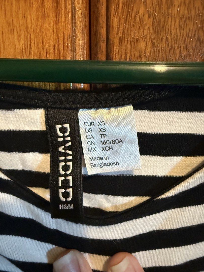 H&M Divided Striped Crop Top - XS (Category: Shirts) located in Pasay City. Submitted by beyi.d (Listing ID 1429159876, Image 2). Description: H&M Divided Crop Top - Classic black and white stripes - Short sleeves - Size: XS - RFS: decluttering MOP: GCash or Bank Transfer .