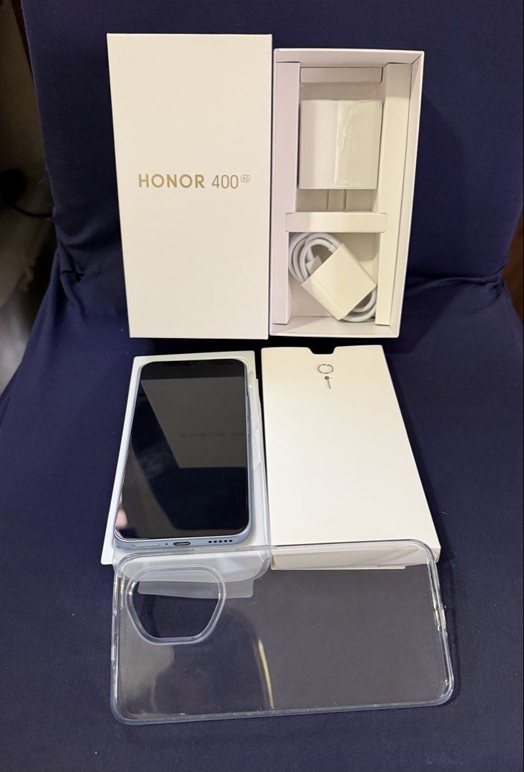Honor 400 (Category: Android Others) located in Antipolo. Submitted by camsart04 (Listing ID 1429060315, Image 1). Description: Honor 400 - complete with box - used for a month as a secondary phone (mainly for hotspot) - 512 GB memory / 12 GB RAM - Color l: Tidal Blue - Dual SIM (can add esim as tested using GOMO) - locked to Globe rfs: extra phone Php 15,000 (fixed price) sf shouldered by the buyer shipping thru Grab, Lalamove.